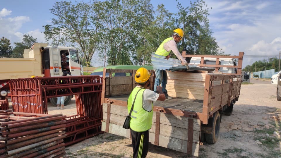 Building boards being loaded for local delivery